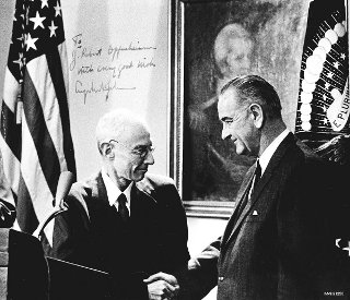 Robert Oppenheimer receiving the Enrico Fermi Award from President Lyndon B. Johnson: President John F Kennedy awarded Oppenheimer the Fermi Awards for his contributions to theoretical physics.  President Johnson (on the right) shakes hands with Oppenheimer (on the left) as he presents the award about one week after President Kennedy’s assassination.