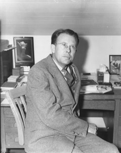 Ernest O Lawrence: Ernest O Lawrence sitting at his desk in his office.