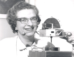 Nancy Roman: Dr. Nancy Roman, one of the nation's top scientists in the space program, is shown with a model of the Orbiting Solar Observatory (OSO) in 1963.