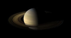 Saturn: View of Saturn and it's rings from Cassini, taken just after Saturn equinox on August 12, 2009.  The Sun is just above the plane of the rings illuminating portions of the planet, rings, and a few of its moons.