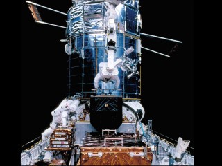 The Final Hubble Space Telescope Servicing Mission: The space shuttle servicing missions of the HST allowed the replacement of scientific instruments and other observatory parts with a limited lifetime, such as gyroscopes and batteries.  The ability to services the HST has greatly extended its orbital lifetime to 24 years in 2014. 