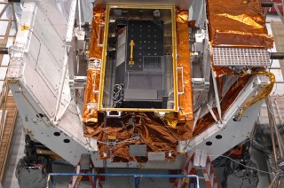 Cosmic Origins Spectrograph: COS (black box) sits in its protective carrier waiting for delivery to the Hubble Telescope. 