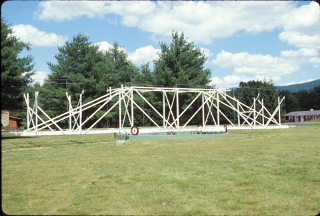 Replica of the Janksy Telescope: Replica of the antenna used by Karl G. Jansky to discover the radio Universe. Affectionately known as “Jansky’s Merry-go-Round,” this antenna’s turntable allowed Jansky to learn the direction of any signal he picked up. It was part of a program by Bell Laboratotries to locate sources of 20.5 MHz radio signals that might interfere with their overseas wireless communications. He located thunderstorms and the famous hiss that he determined came from the center of our Milky Way Galaxy. The discovery was widely publicized, appearing in the New York Times of May 5, 1933. Grote Reber, another pioneer of radio astronomy, suggested that this replica be built in Green Bank to exact specification, down to sourcing old Model T tires for the rotation axis.