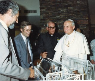 With Pope John Paul II: Nick Woolf with Roger Angel and Fr. George Coyne showing a model of the Large Binocular Telescope to the Pope.