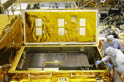 Cosmic Origins Spectrograph: The Cosmic Origins Spectrograph (COS) sits inside the Orbital Replacement Unit Carrier prior to installation on Hubble Space Telescope in 2009. COS restored UV spectroscopy to Hubble's scientific arsenal.