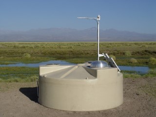 Auger Detectore: The Pierre Auger Observatory has 1,600 water tanks arrayed throughout a 1,200-square mile area in western Argentina.  Each of the 3,000-gallon tanks is a particle detector for capturing cosmic rays.  The Auger Observatory uses both water tanks and optical detectors to measure the cosmic ray air showers.